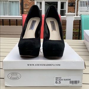 Black platform pumps